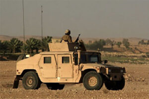 Humvee Soldier in dessert